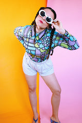 long sleeve purple and blue abstract printed blouse with collar and zipper in the back women's vintage 1960's