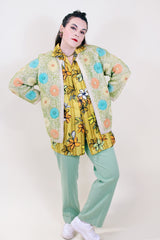 Women's vintage 1960's Hand Decorated Hand Loomed Fully Fashioned label cream colored wool open front cardigan with all over embroidered pastel flowers.