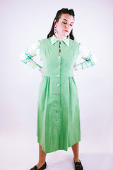 sleeveless midi length pastel green suede dress buttons up the front