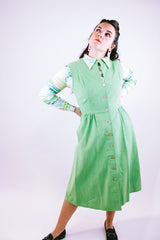 sleeveless midi length pastel green suede dress buttons up the front