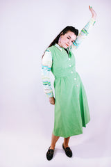 sleeveless midi length pastel green suede dress buttons up the front