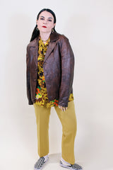 Women's vintage 1970's Adler Leather MFG. CO., Made in California label short length long sleeve brown leather button up jacket with double lapel.