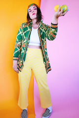 stretchy polyester yellow flare pants with white polka dots vintage women's 1970's