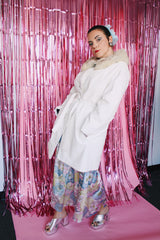 long sleeve long white leather button up coat with fur trim around neck vintage 1970's