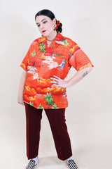 Women's or men's vintage 1970's Made in Hawaii short sleeve red all over Hawaiian print button up shirt.