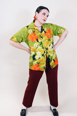 Women's or men's vintage 1970's Sears Hawaii label short sleeve Cotton material all over green Hawaiian print button up shirt with one chest pocket and double lapel.