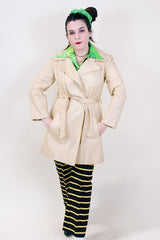 Women's vintage 1970's New England Sportswear Company cream colored leather long length long sleeve wrap coat.