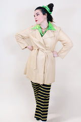 Women's vintage 1970's New England Sportswear Company cream colored leather long length long sleeve wrap coat.