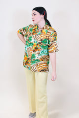 Women's or men's vintage 1970's Hawaiian Luau label short sleeve button up shirt in all over brown Hawaiian print.