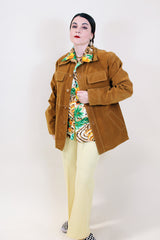 Men's vintage 1970's Pacific Trail Sportswear label long sleeve light brown colored PVC suede button up jacket with dagger collar.