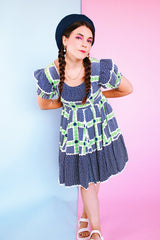 white, navy, and green 1950's western square dance dress puff sleeves knee length