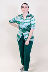 Women's or men's vintage 1970's Innovation by National Shirt Shops short sleeve button up shirt with collar in all over green and blue print in slinky polyester material.
