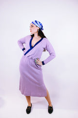 vintage 1980's midi length long sleeve wool knit dress with deep v neck in purple with darker purple trim