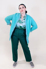 Women's vintage 1960's Boutique, Bullock's, Santa Ana label long sleeve blue open front long length cardigan with fringe trim in a wool material.