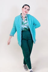 Women's vintage 1960's Boutique, Bullock's, Santa Ana label long sleeve blue open front long length cardigan with fringe trim in a wool material.