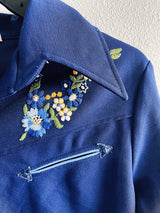 Women's vintage western style 1970's California Ranchwear label long sleeve navy blue blouse with pointy collar and pearly blue popper buttons. Has floral embroidery on shoulders.