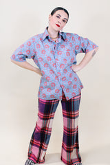 Women's or men's vintage 1970's JCPenney label short sleeve button up shirt with dagger collar in a lightweight polyester blue paisley print material.