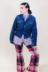 Women's or men's vintage 1970's Levi's Panatela Sportswear label short length long sleeve navy blue corduroy jacket with dagger collar, two chest pockets, and tortoise buttons.