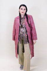 Women's vintage 1970's long sleeve long length mauve pink colored leather and suede lightweight button up jacket.