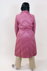 Women's vintage 1970's long sleeve long length mauve pink colored leather and suede lightweight button up jacket.