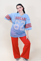 Women's or men's vintage 1980's Fab Knit, Made in USA label short sleeve long length blue, white, and red mesh nylon sports jersey.