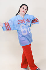 Women's or men's vintage 1980's Fab Knit, Made in USA label short sleeve long length blue, white, and red mesh nylon sports jersey.