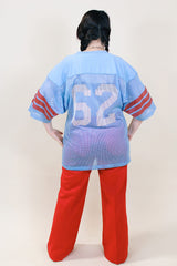 Women's or men's vintage 1980's Fab Knit, Made in USA label short sleeve long length blue, white, and red mesh nylon sports jersey.