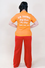 Women's vintage 1950's King Louie by Holiday label short sleeve orange cotton button up bowling blouse.