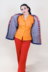 Women's vintage 1980's denim cotton long sleeve jacket with popper buttons up the front and two front pockets.