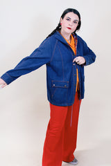 Women's vintage 1980's denim cotton long sleeve jacket with popper buttons up the front and two front pockets.