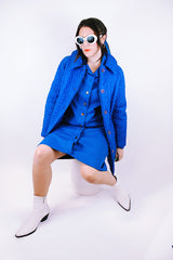 long bright blue quilted puffy coat buttons up the front with collar vintage women's