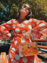 box purse with white marble panels and one side with painting plastic handle and green velvet interior vintage 1960's