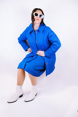 long bright blue quilted puffy coat buttons up the front with collar vintage women's