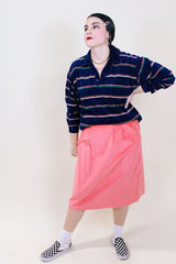 Women's or men's 1980's Campus Velour, Made in USA label long sleeve navy soft velour pullover sweater with half button closure and short pointy collar with thin all over vertical stripes.