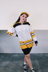 Men's vintage 1960's GC Knitting, Made in Canada label long sleeve cotton material white, yellow, and black hockey jersey with tie front neckline.