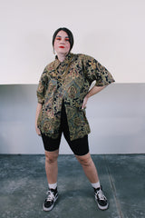 Men 's vintage 1980's Tori Richard, Honolulu, Since 1956, Made in USA label short sleeve button up shirt in brown and black paisley print.