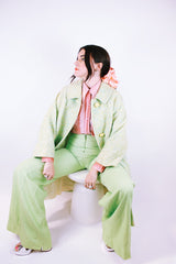 long length long sleeve green wool coat with three button closure and collar vintage 1960's