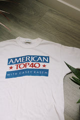 short sleeve white American top 40 1980's graphic tee