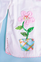 white button up cotton shirt with floral patchwork throughout vintage women's 1960's