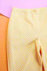 stretchy polyester yellow flare pants with white polka dots vintage women's 1970's