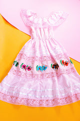 pale pink vintage off the shoulder midi length dress with embroidered flowers and lace and ribbon details