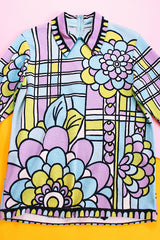 long sleeve purple and blue abstract printed blouse with collar and zipper in the back women's vintage 1960's