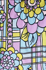 vlong sleeve purple and blue abstract printed blouse with collar and zipper in the back women's vintage 1960's