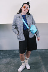 Women's vintage 1960's Pendelton label wool button up lightweight plaid jacket with big shell buttons up the front. Cream, navy, tan, and blue. Has pockets and shoulder pads.