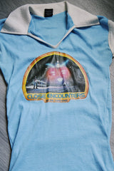 short sleeve baby blue Close Encounters 1978 graphic tee with white trim on cuffs and collar