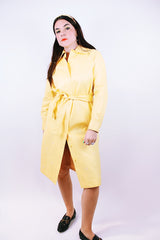 long sleeve pastel yellow vinyl shirt dress with matching tie and embroidered flowers vintage women's