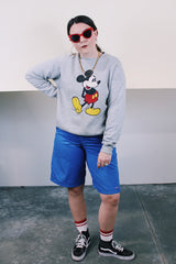 Women's or men's vintage 1980's Disney Character Fashions, Made in USA label long sleeve heather grey pullover crewneck sweater with Mickey Mouse graphic on the front.
