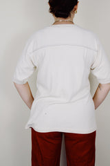 short sleeve cream colored cotton t-shirt with cowboy houston graphic on the front vintage 1970's