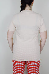 short sleeve light tan cotton t-shirt with Smiler Ariola Records graphic on the front 1970's