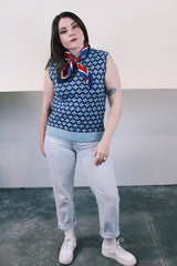 Women's or men's vintage 1970's sleeveless navy and blue printed sweater vest with ribbed trim. Soft acrylic material.